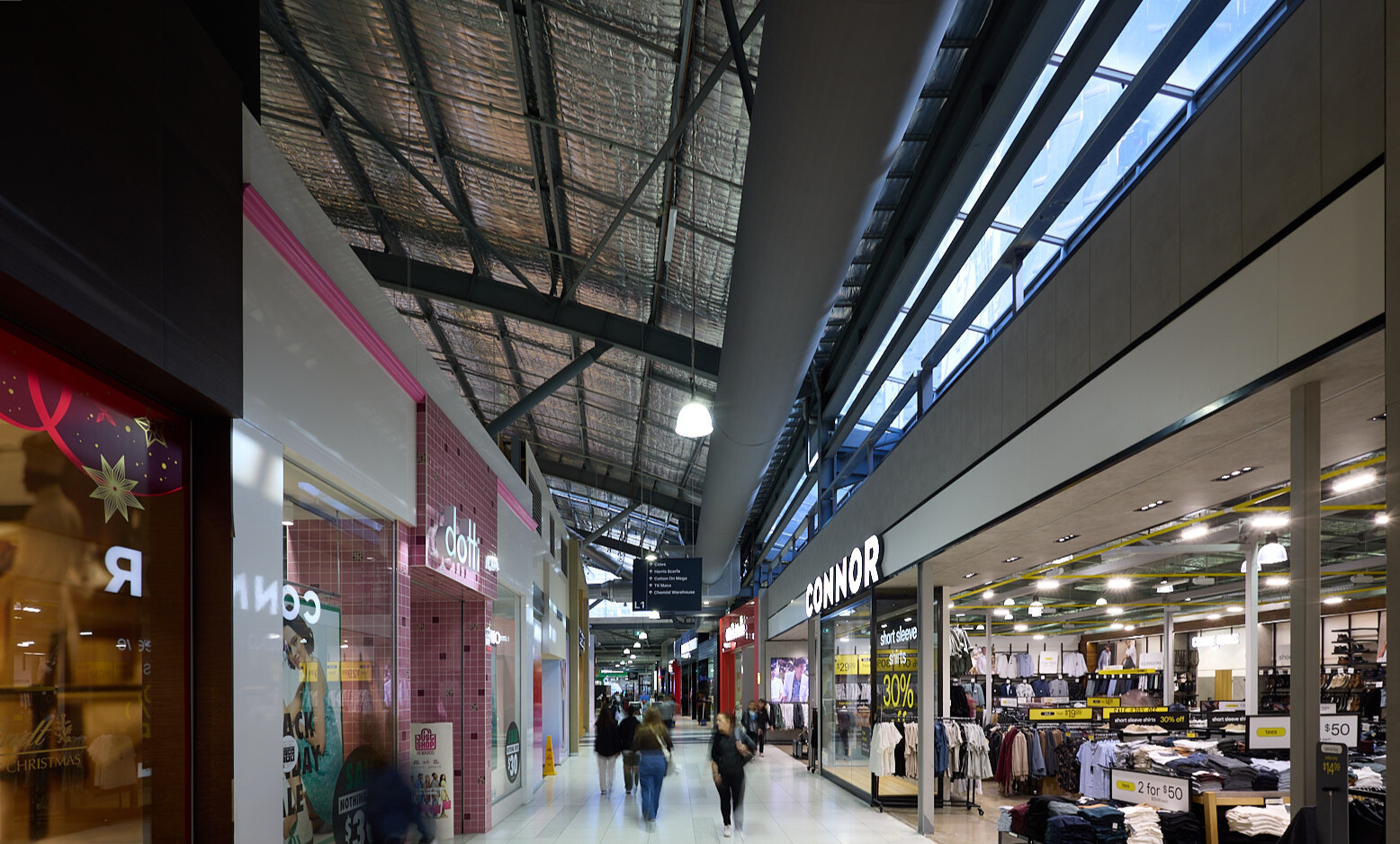 Gray fabric ducting installed in the open ceiling of the Spencer Outlet Centre in Melbourne, Australia