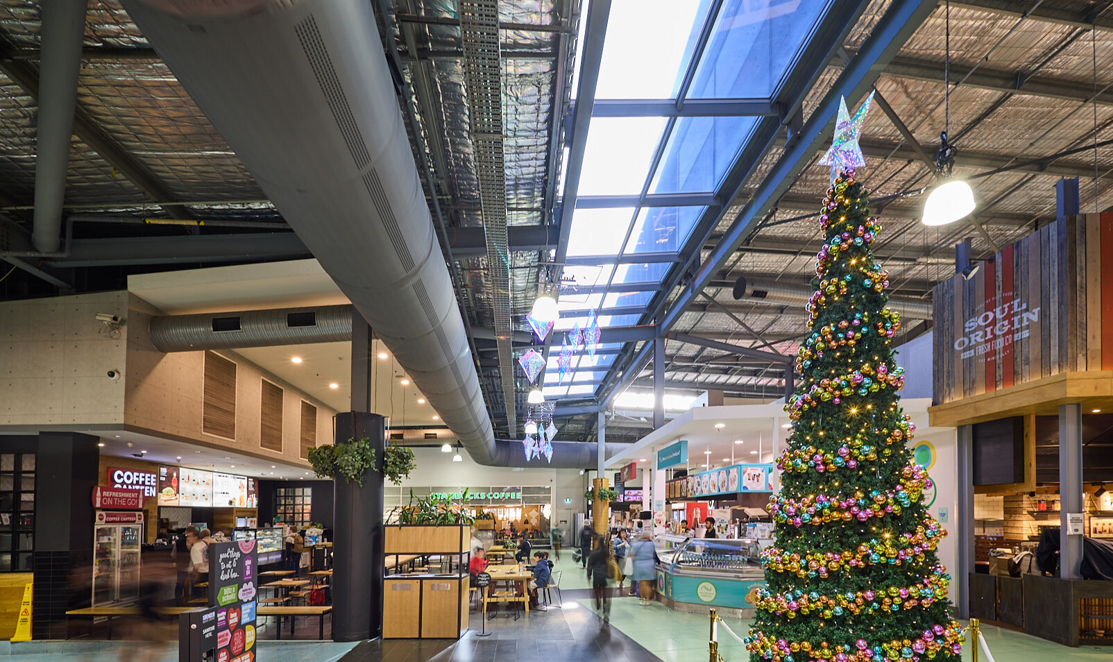 Gray fabric ducting installed in the open ceiling of the Spencer Outlet Centre in Melbourne, Australia