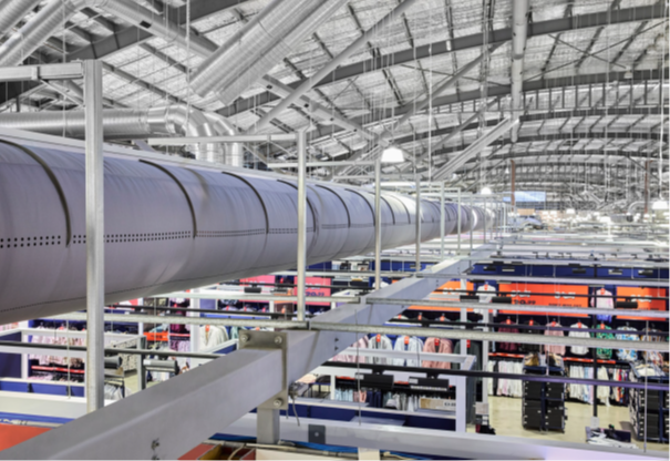 Gray fabric ducting installed in the open ceiling of the Spencer Outlet Centre in Melbourne, Australia