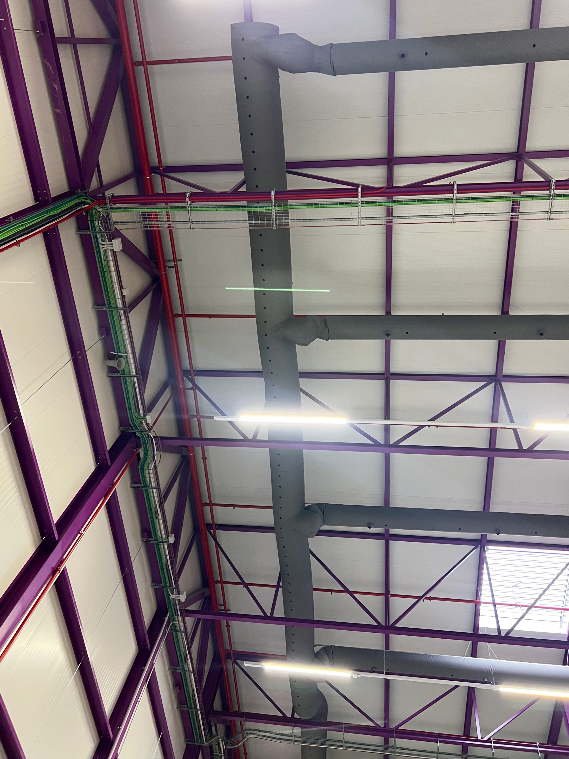 Close up of HVAC fabric ducting system installed in warehouse