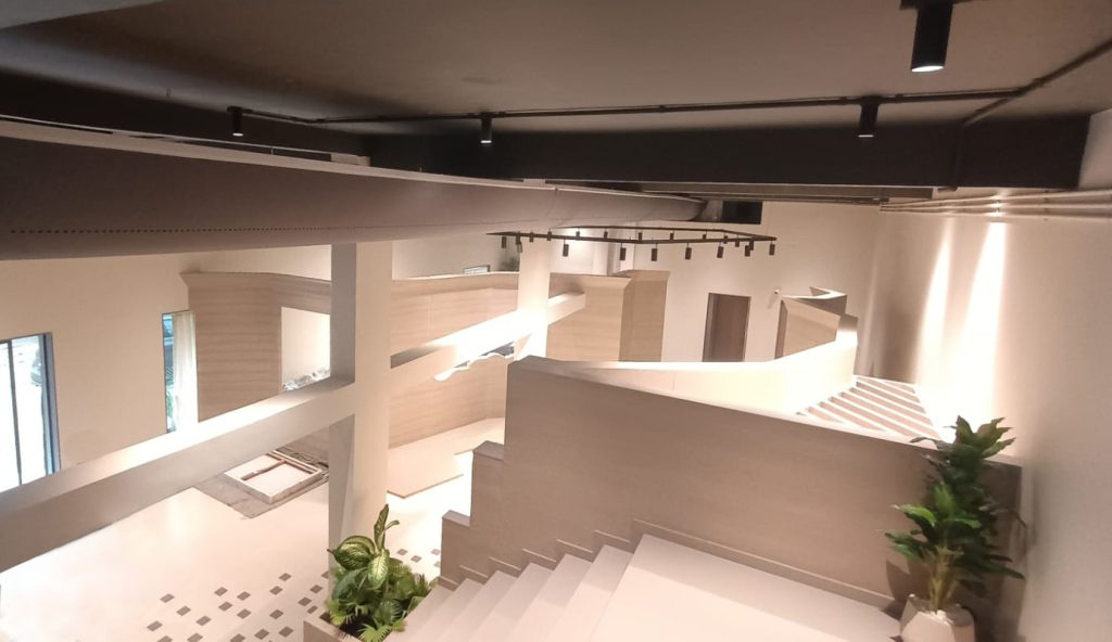 A room fool of corners and architectural obstacles features a fabric duct by FabricAir to illustrate the difference between flex duct and fabric duct