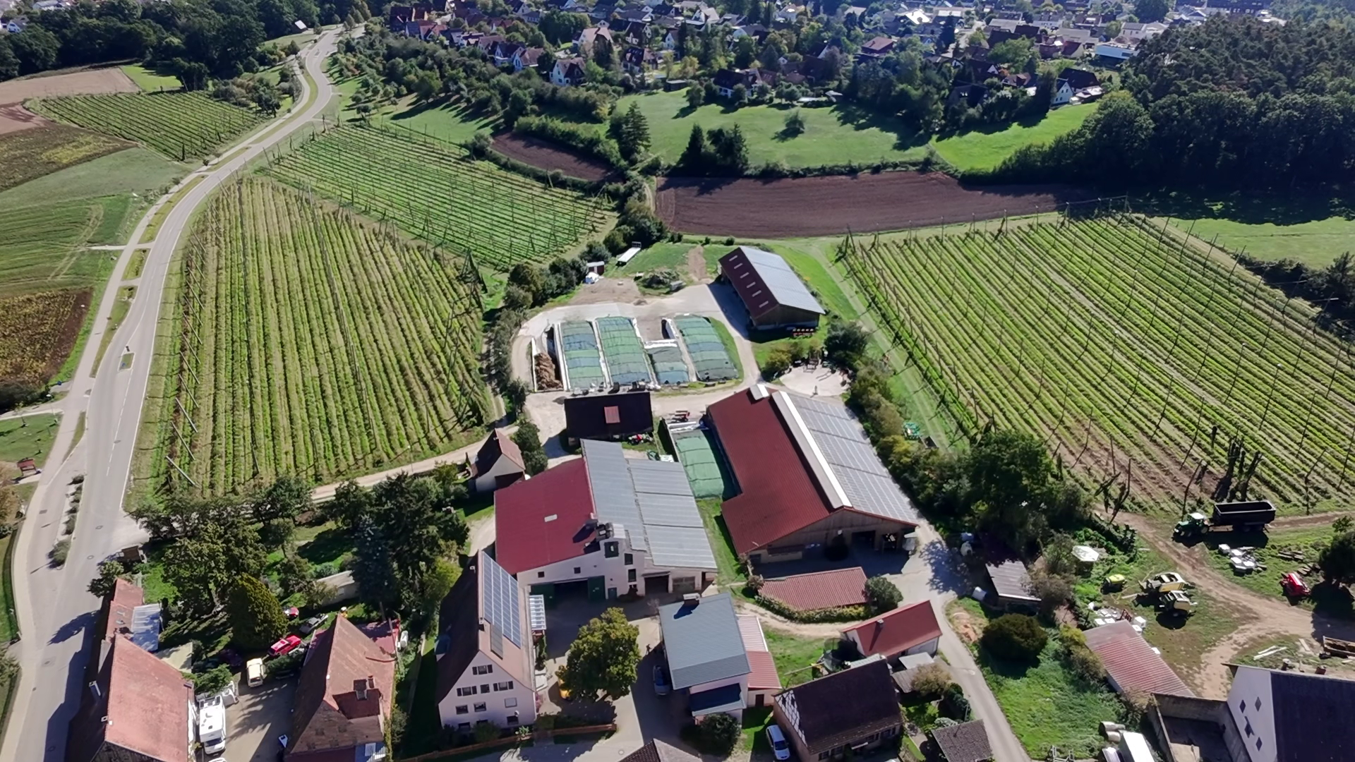 Overhead drone view of a farm where barn ventilation was installed with FabricAir ClimaBarn's fabric ducting