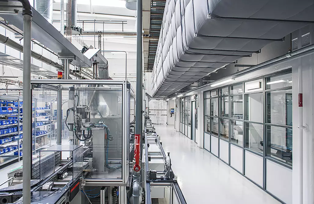 Grey, industrial fabric duct installed inside Danfoss warehouse, Denmark
